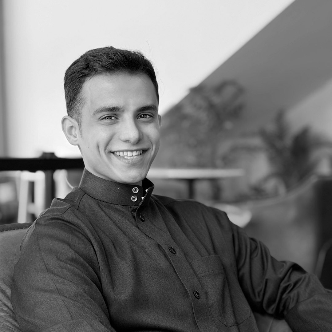 Young man smiling in casual portrait