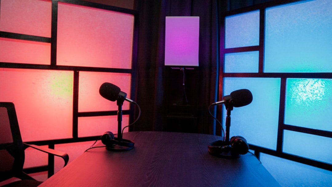 Podcast style microphone setup with warm lighting